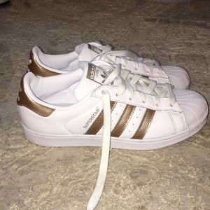 Rose gold Adidas Superstars